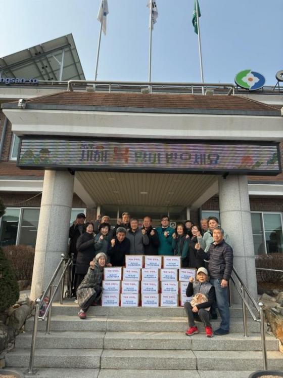 양산면 지역사회보장협의체, 저소득 노인 18가구에 떡국 꾸러미 전... 이미지